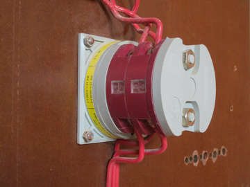 Rear of the switch with the line and load side wires.