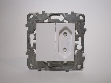 Europlug socket module from the front. It has a small recess for a Europlug to fit.