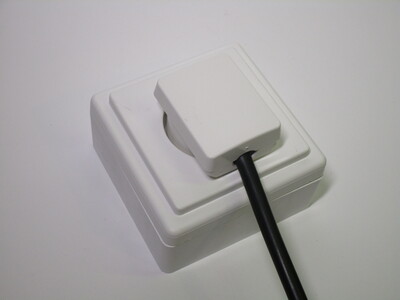 Plug inserted in socket.