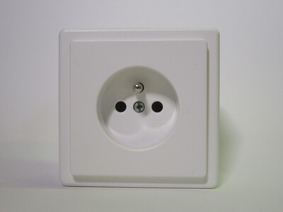 Front of the power socket.