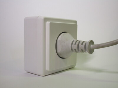 Side view of the socket with a plug inserted.