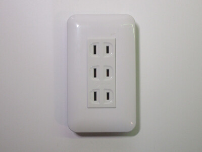 Front of the socket, with its three outlets.