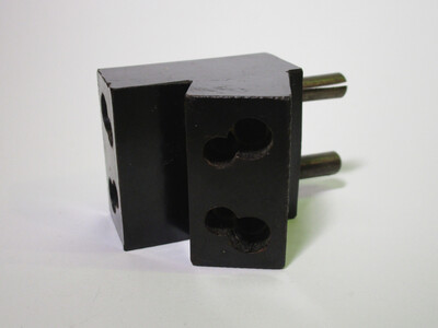 View of the sockets of the adaptor with the two holes for 5A and 2A plugs.