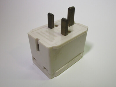 Picture of the adaptor. A socket is present on the bottom.