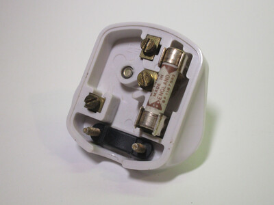 Internals of the plug. A fuse is present.