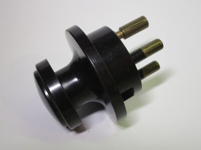 Side view of the plug showing the mushroom-shaped handle.