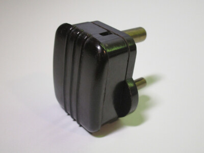 Rear view of the plug. There are some decorative lines in the housing.